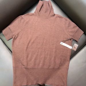 Brand new short sleeve wool turtleneck sweater.